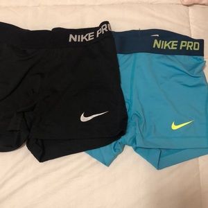 Two pairs of Nike Pro spandex